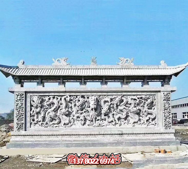 企業(yè)門(mén)口處擺放大理石九龍壁雕塑